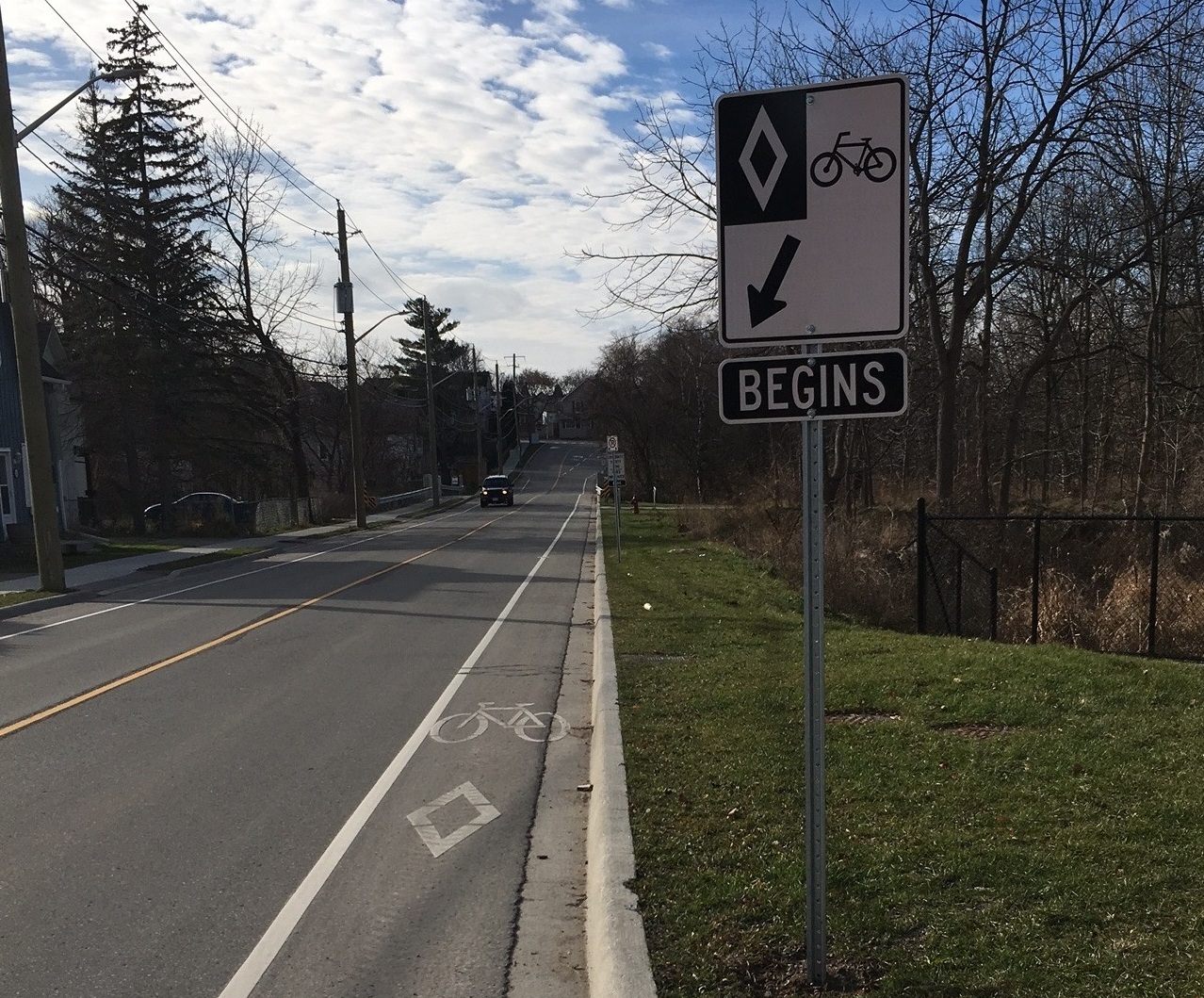 A picture of conventional bike lanes on Srigley Street looking westbound